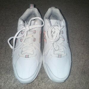 White and pink new balances